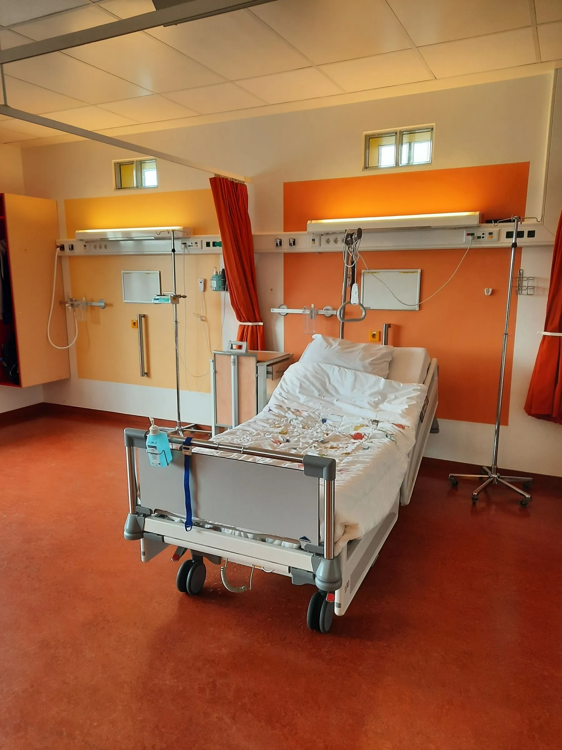 Patient room at Trimmurti Hospital